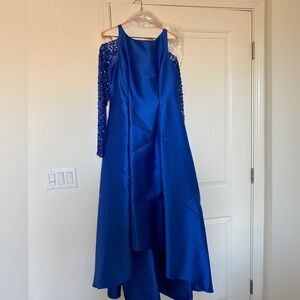 Only worn once for an evening wedding. Sequin bolero included.